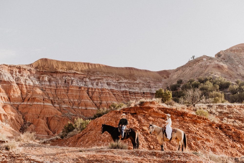 Texas Elopement Couple on horse back eloping in Palo Duro Canyon State Park by Austin Wedding Photographer Fyrelite Photography